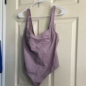 NWT Free People bodysuit in dawn pink or pink rose